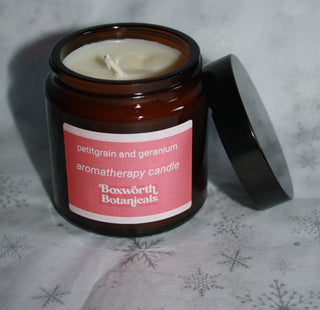 Small travel candle made from GM free soya wax and pure petitgrain and geranium essential oils